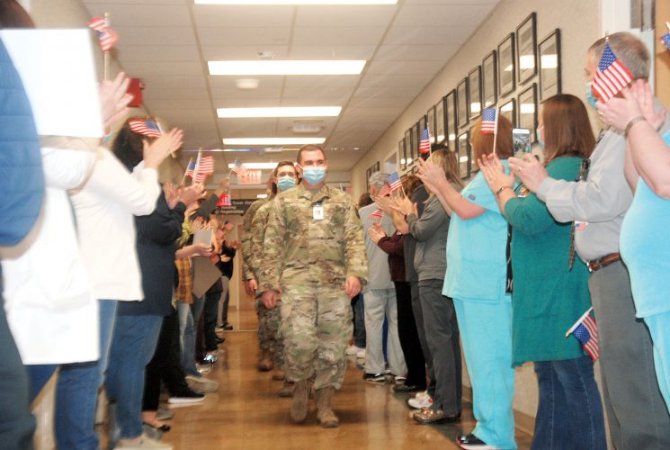 Camden Clark celebrates departing Guard members